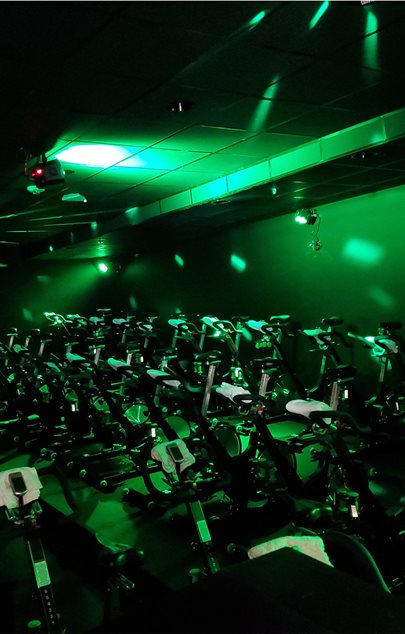 spin bikes in a club like atmosphere
